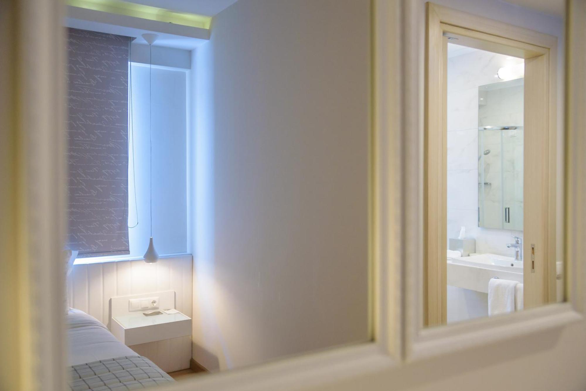Calma Hotel & Spa Kastoriá Rom bilde